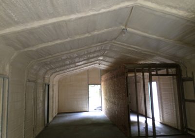 A metal building insulated with spray foam from FoamTech