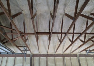 a-metal-building-ceiling-encapsulated-using-spray-foam-insulation-in-richmond-VA