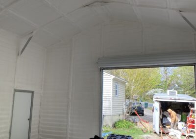 A metal garage encapsulated in spray foam insulation in richmond va