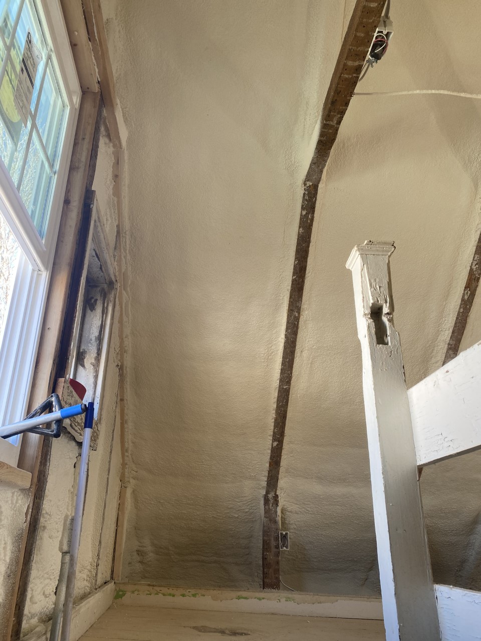 Ceiling insulated with spray foam insulation for energy efficiency